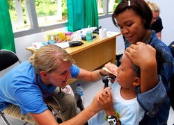 Normal_us_navy_100720-n-4044h-292_latter-day_saint_charities_nurse_practitioner_michelle_crawford_performs_a_general_examination_during_a_pacific_partnership_2010_medical_civic_action_program