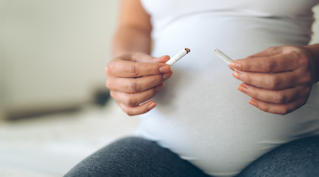 Carousel_health-minded-pregnant-woman-breaks-last-cigarette-2021-08-26-17-30-28-utc