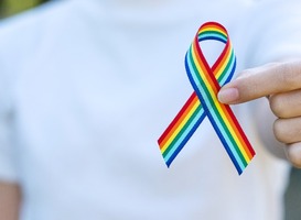 Normal_hand-showing-lgbtq-rainbow-ribbon-2022-11-07-22-24-44-utc__1_