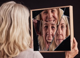 Normal_bipolar-woman-broken-mirror-or-reflection-of-anxi-2022-12-24-02-03-45-utc__1_