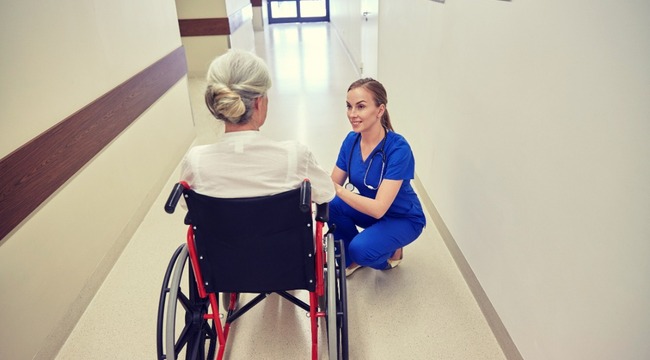 Carousel_nurse-with-senior-woman-in-wheelchair-at-hospital-2022-12-16-09-49-56-utc__1_