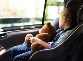 Normal_a-little-girl-in-a-car-seat-2022-12-16-00-29-44-utc__1_