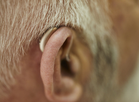 Normal_close-up-of-senior-man-with-hearing-aid-2022-12-16-22-16-49-utc