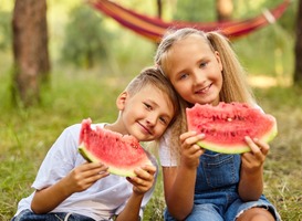 Normal_kids-eating-watermelon-in-the-park-2022-08-01-05-12-16-utc-min__1_