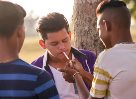 Normal_group-of-teenagers-boy-smoking-cigarette-with-frie-2021-08-26-15-46-10-utc