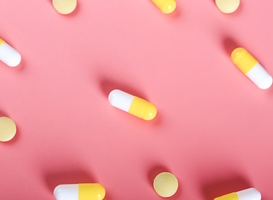 Normal_yellow-pills-pills-on-a-pink-background-2022-11-01-00-07-46-utc