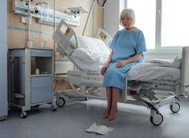 Normal_upset-lonely-senior-woman-sitting-on-bed-in-hospit-2023-11-27-05-09-30-utc__1_